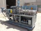 Used American Maplan Approximate 62mm Counter-Rotating Twin Screw Extruder, Model DSK62. (2) 2.44
