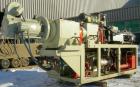 USED: American Maplan conical counter-rotating twin screw, 62 mm, model DSK62. Approximate 47.1:1 gearbox ratio. Built-in oil heating and cooling with tank, heat exchanger and pump. 4 zone top vented...