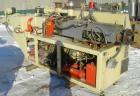 USED: American Maplan conical counter-rotating twin screw, 62 mm, model DSK62. Approximate 47.1:1 gearbox ratio. Built-in oil heating and cooling with tank, heat exchanger and pump. 4 zone top vented...
