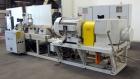 Used American Maplan 110mm Counter-Rotating Twin Screw Extruder, Model TS-110.  Approximate 26 to 1 L/D ratio.  Top vented barrel with electrically heated 1 and 2 barrel zones, zones 3, 4, and 5 offe...