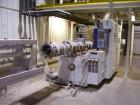USED: American Maplin model TS-110 counter-rotating twin screw extruder. 110 mm screw diameter. Unit vented and equipped with X800 barrel and T/C screws, double compression. Unit driven by a 125 Vect...