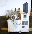 Used American Maplan 92mm Counter-Rotating Twin Screw Extruder, Model TS-92. Approximate 26 to 1 L/D ratio. 5 Zone barrel, (1) section top vented. Electrically heated, liquid cooled with pump, tank, ...