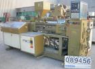 USED: Amut twin screw extruder, 92 mm screw diameter, model BA92. Approximate 22:1 L/D ratio. Counter-rotating screw design. 5 zone top vented, electrically heated, air cooled barrel with vacuum pump...