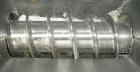 USED: Amut twin screw extruder, 92 mm screw diameter, model BA92. Approximate 24:1 L/D ratio, counter rotating screw design, 6 zone top vented electrically heated, air cooled barrel with vacuum pump....