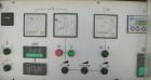 USED: Amut twin screw extruder, 92 mm screw diameter, model BA92. Approximate 24:1 L/D ratio, counter rotating screw design, 6 zone top vented electrically heated, air cooled barrel with vacuum pump....