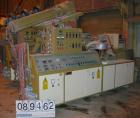 USED: Amut twin screw extruder, 92 mm screw diameter, model BA92. Approximate 24:1 L/D ratio. Counter-rotating screw design. 6 zone top vented, electrically heated, air cooled barrel with vacuum pump...