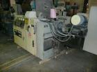 Used Cincinnati Milicron Conical Counter-Rotating Twin Screw Extruder, 35 mm, model CM35. Electrically heated, water cooled vented barrel with pump. Water cooled feed throat with a dosing feeder. App...
