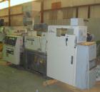 Used Cincinnati Milicron Conical Counter-Rotating Twin Screw Extruder, 55 mm, model CM55HP. Electrically heated, water cooled vented barrel with pump. Water cooled feed throat with a dosing feeder. A...