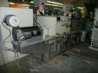Used Cincinnati Milicron Conical Counter-Rotating Twin Screw Extruder, 55 mm, model CM55HP. Electrically heated, water cooled vented barrel with pump. Water cooled feed throat with a dosing feeder. A...