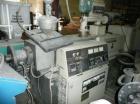 Used Cincinnati Milicron Conical Counter-Rotating Twin Screw Extruder, 55 mm, model CM55HP. Electrically heated, water cooled vented barrel with pump. Water cooled feed throat with a dosing feeder. A...