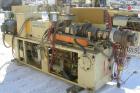 USED: Cincinnati conical counter-rotating twin screw extruder, 55 mm, model CM55. Approximate 20:1 L/D ratio. Approximate 48:1 gearbox ratio. Built-in oil heating and cooling with tank, heat exchange...