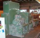 USED: Cincinnati counter-rotating twin screw extruder, 92 mm, model CM92HP. Electrically heated, water cooled 5 zone top vented barrel with tank, heat exchanger and pump. Built-in oil cooling/heating...