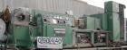 USED: Cincinnati counter-rotating twin screw extruder, 92 mm, model CM92HP. Electrically heated, water cooled 5 zone top vented barrel with tank, heat exchanger and pump. Built-in oil cooling/heating...
