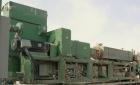 USED: Cincinnati counter-rotating twin screw extruder, 92 mm, model CM92HP. Electrically heated, water cooled 5 zone top vented barrel with tank, heat exchanger and pump. Built-in oil cooling/heating...