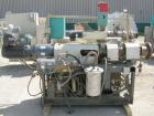 Used Cincinnati Milicron Conical Counter-Rotating Twin Screw Extruder, 35 mm, model CM35. Electrically heated, water cooled 3 zone vented barrel (no cooling system) with a Kinny vacuum pump, model A0...