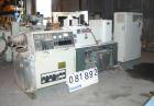 USED: Cincinnati Milacron Model CM-55HP Conical Twin Screw Counter-Rotating Extruder having an electrically heated, liquid cooled and vented barrel at an approximate 42