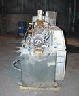USED: Cincinnati Milacron Model CM-55HP Conical Twin Screw Counter-Rotating Extruder having an electrically heated, liquid cooled and vented barrel at an approximate 42
