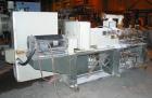 USED: Cincinnati Milacron Model CM-55HP Conical Twin Screw Counter-Rotating Extruder having an electrically heated, liquid cooled and vented barrel at an approximate 42