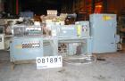 USED: Cincinnati Milacron Model CM-65HP Conical Twin Screw Counter-Rotating Extruder having an electrically heated, liquid cooled and vented barrel at an approximate 42