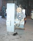 USED: Cincinnati Milacron Model CM-65HP Conical Twin Screw Counter-Rotating Extruder having an electrically heated, liquid cooled and vented barrel at an approximate 42