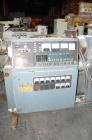 USED: Cincinnati Milacron Model CM-65HP Conical Twin Screw Counter-Rotating Extruder having an electrically heated, liquid cooled and vented barrel at an approximate 42