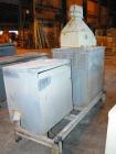 USED: Cincinnati Milacron Model CM-65HP Conical Twin Screw Counter-Rotating Extruder having an electrically heated, liquid cooled and vented barrel at an approximate 42