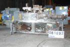 USED: Cincinnati Milacron Model CM-65HP Conical Twin Screw Counter-Rotating Extruder having an electrically heated, liquid cooled and vented barrel at an approximate 42