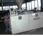 Used-Cincinnati Milacron CMT 45 Counter- Rotating Twin Screw Extruder. Maximum capacity 265 lbs (120 kg/hour). Screw diamete...