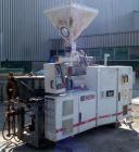 Used Cincinnati Milacron 55mm Conical Counter-Rotating Twin Screw Extruder, Model Pinnacle E55 PIN. Approximate 20 to 1 L/Dratio. Electrically heated, water cooled 3 zone vented barrel. Water cooled ...