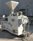 Used Cincinnati Milacron 55mm Conical Counter-Rotating Twin Screw Extruder, Model Pinnacle E55 PIN. Approximate 20 to 1 L/Dratio. Electrically heated, water cooled 3 zone vented barrel. Water cooled ...