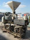 Used Cincinnati Milacron 55mm Conical Counter-Rotating Twin Screw Extruder, Model Pinnacle E55 PIN. Approximate 20 to 1 L/Dratio. Electrically heated, water cooled 3 zone vented barrel. Water cooled ...