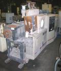 USED: Cincinnati Milacron twin screw extruder, model E55 Pinnacle. 55 mm conical screws, counter rotating, 21:1 L/D, electrically heated, water cooled, vented barrel with vacuum pump, 40 hp DC motor ...