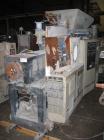 USED: Cincinnati Milacron twin screw extruder, model E55 Pinnacle. 55 mm conical screws, counter rotating, 21:1 L/D, electrically heated, water cooled, vented barrel with vacuum pump, 40 hp DC motor ...