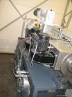 Used Cincinnati Titan 45 Conical Twin Screw Extruder for WPC profiles and PVC pipe. Screw diameter 1.77