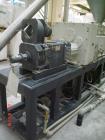 Used Cincinnati Twin-Screw Extruder Conical Milacron CMT 80-L. Year of production: 1995. Work hours: 39218 h D.C. shunt motor: 46kW Rating, installed and set: 1480.0 min-1 Speed: 297 Nm Torque: 0.7 k...