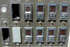 Used Cincinnati Milicron Conical Counter-Rotating Twin Screw Extruder, 55 mm, model E55 Pinnacle. Electrically heated, water cooled 4 zone vented barrel with pump. Water cooled feed throat with a dos...