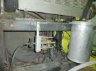 Used Cincinnati Milicron Conical Counter-Rotating Twin Screw Extruder, 55 mm, model E55 Pinnacle. Electrically heated, water cooled vented barrel with pump. Water cooled feed throat with a dosing fee...