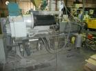Used Cincinnati Milicron Conical Counter-Rotating Twin Screw Extruder, 55 mm, model E55 Pinnacle. Electrically heated, water cooled vented barrel with pump. Water cooled feed throat with a dosing fee...