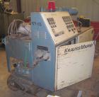 Used Krauss Maffei 50mm Counter-Rotating Twin Screw Extruder, Type KMD-2-50KK. (2) 50 mm diameter screws. Dosing feeder. Gearbox is direct driven by a 30 hp DC motor. Integral panel has 8 zones of di...