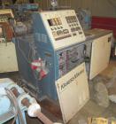 Used Krauss Maffei 40mm Counter-Rotating Twin Screw Extruder, Type KMD2-40KK. (2) 40 mm diameter screws. Gearbox is direct driven by a 25 hp DC motor. Integral panel has 8 zones of RKC digital contro...