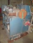 Used Krauss Maffei 40mm Counter-Rotating Twin Screw Extruder, Type KMD2-40KK. (2) 40 mm diameter screws. Gearbox is direct driven by a 25 hp DC motor. Integral panel has 8 zones of RKC digital contro...