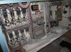 Used Krauss Maffei 40mm Counter-Rotating Twin Screw Extruder, Type KMD2-40KK. (2) 40 mm diameter screws. Gearbox is direct driven by a 25 hp DC motor. Integral panel has 8 zones of RKC digital contro...