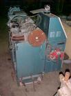 Used Krauss Maffei 40mm Counter-Rotating Twin Screw Extruder, Type KMD2-40KK. (2) 40 mm diameter screws. Gearbox is direct driven by a 25 hp DC motor. Integral panel has 8 zones of RKC digital contro...