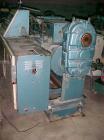 Used Krauss Maffei 40mm Counter-Rotating Twin Screw Extruder, Type KMD2-40KK. (2) 40 mm diameter screws. Gearbox is direct driven by a 25 hp DC motor. Integral panel has 8 zones of RKC digital contro...