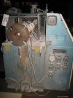 Used Krauss Maffei Model KMD2-50KK Counter-Rotating Twin Screw Extruder. 50 mm Diameter screws, 30 hp motor, 6 barrel and 8 die zones, serial #205325, year 1995.