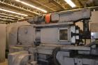 Used Ikegai 65mm Twin Screw Extruder, Model PCM-65II. Liquid heated, and cooled. 8 Zone top vented barrel. Top mounted twin screw feeder. Approximate 64