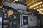 Used Ikegai 65mm Twin Screw Extruder, Model PCM-65II. Liquid heated, and cooled. 8 Zone top vented barrel. Top mounted twin screw feeder. Approximate 64
