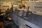 Used Ikegai 65mm Twin Screw Extruder, Model PCM-65II. Liquid heated, and cooled. 8 Zone top vented barrel. Top mounted twin screw feeder. Approximate 64