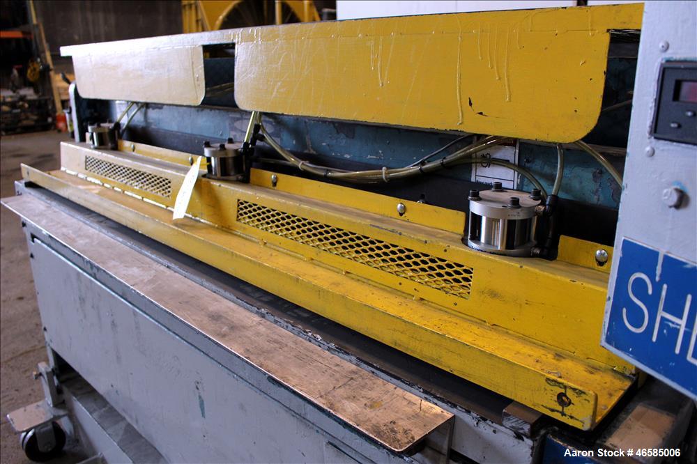 Used 72" Wide In-Line Shear. Driven by a approximate 5hp motor(no tag). Includes controls. Mounted on carbon steel frame.