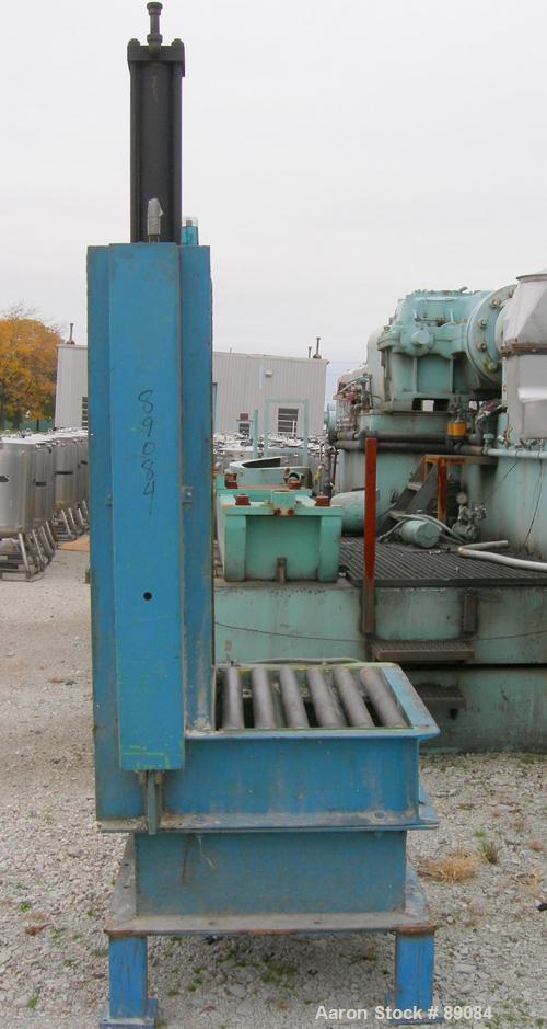 USED: Goodman hydraulic guillotine cutter, model 15. (1) 30" wide blade, single ram. Mounted on a frame with approximate 30" wide x 22" long roller conveyor infeed.Set up for maximum bale size of 30"...